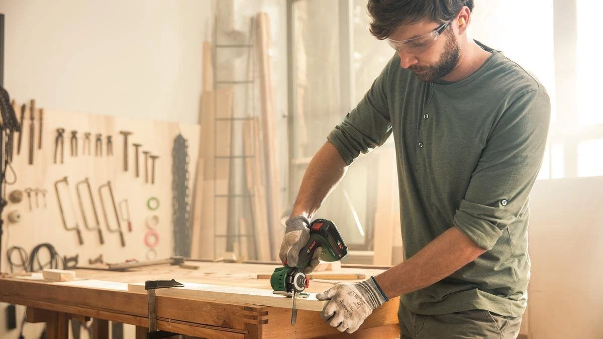 Bosch AdvancedCut 18 Microkettingzaag - Met 1 X 18 V Accu En Lader 9 Bosch AdvancedCut 18 Microkettingzaag - Met 1 X 18 V Accu En Lader - Afbeelding 9